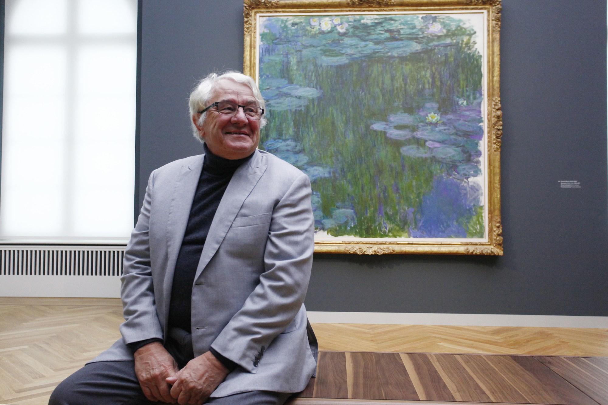 POTSDAM, GERMANY - JANUARY 19: Hasso Plattner, who is co-founder of German software maker SAP and a financial backer of the Barberini Museum, poses in front of The painting of the french impressionist Monet titled Water Lilies during a press preview on January 19, 2017 in Potsdam, Germany. The art museum will have a permanent collection from Plattner's foundation that focuses on 20th century German art, both from West and East Germany. The museum opens to the public on January 23 with an exhibition on Impressionist landscapes. (Photo by Michele Tantussi/Getty Images) Local Caption *** Hasso Plattner; Ortrud Westheider.
